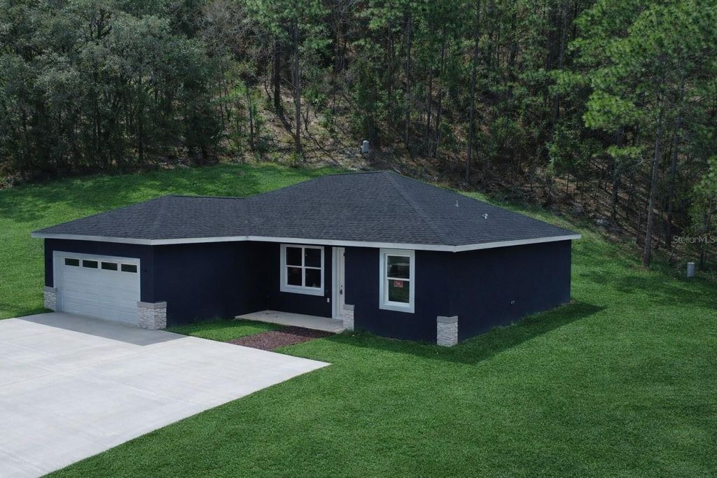 Photo of 12222 SW 95th Place, Dunnellon, FL 34432 (MLS # OM716839)