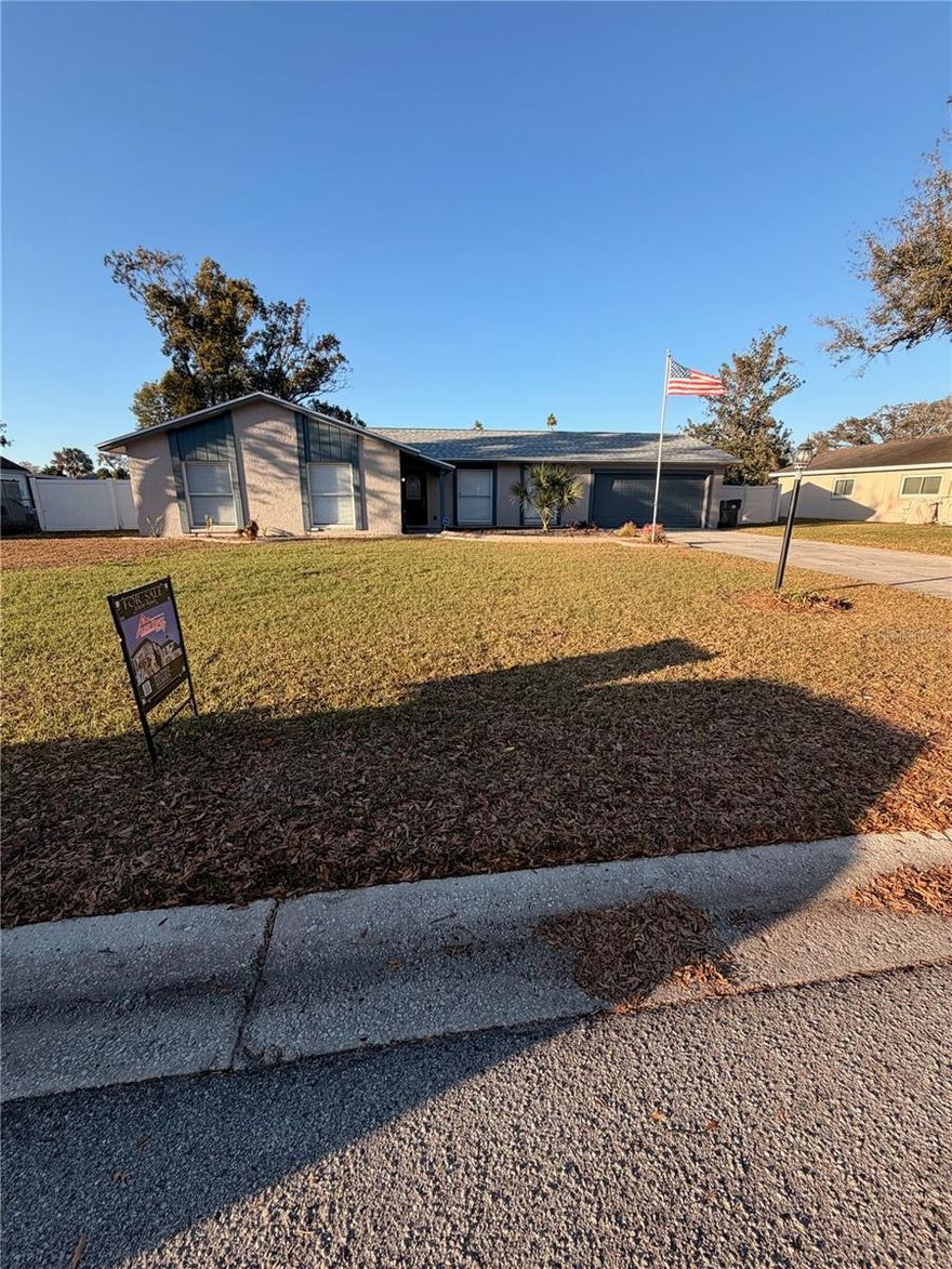 Welcome to this well-maintained canal-front home offering direct access to beautiful Lake Valrico, where residents enjoy optional HOA amenities including lake access, tennis courts, and a large picnic pavilion — all with a low, optional fee. Lovingly cared for by the same owners for over 50 years, this home reflects true pride of ownership and is now ready for its next chapter. Conveniently located with a quick commute to Downtown Tampa, this property offers both lifestyle and accessibility.

This home features numerous recent updates for added peace of mind. The roof was replaced in December 2025 and includes a transferable warranty. The water heater is approximately six months old, and the A/C system features a recently replaced condenser (approximately six months old) for improved efficiency and performance. Additional improvements include a new garage door opener, resealed patio roof, and a rebuilt seawall. The home has also been freshly painted inside and out, with new carpet in the bedrooms.

Outdoor living is a highlight, featuring a spacious screened-in patio with additional yard space overlooking the canal — perfect for relaxing, entertaining, and enjoying peaceful water views.

Inside, you’ll find a functional layout with an inviting entry foyer, dedicated laundry room, and brand-new flooring in the kitchen. The second bathroom was fully renovated just three months ago, featuring a new vanity. A portion of the garage has been thoughtfully converted to expand the kitchen and laundry space, creating an open-concept kitchen that flows into a large family room, ideal for everyday living and gatherings.

Conveniently located near shopping, dining, and major commuter routes, and zoned for highly rated schools (7+ out of 10), this home is not located in a high-risk flood zone, offering added peace of mind while enjoying the benefits of waterfront living.