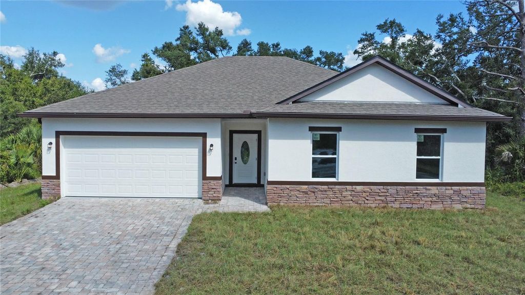 Photo of 80 Sequoyah Drive, Port Charlotte, FL 33954 (MLS # O6297616)