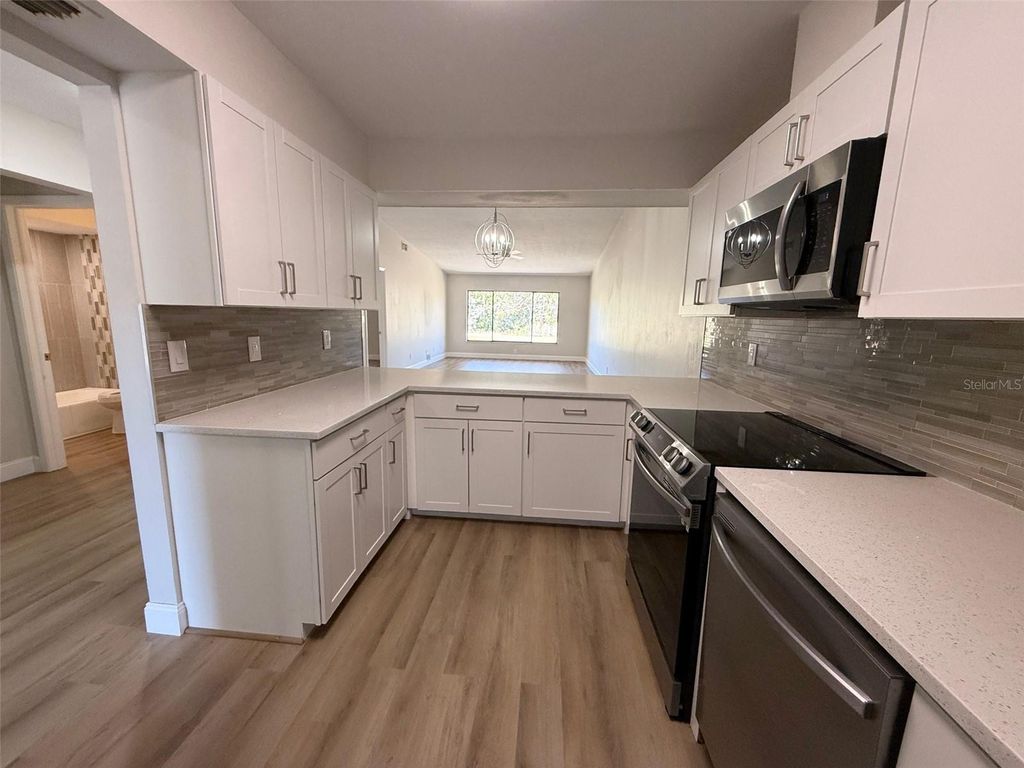Photo of 3505 Tarpon Woods Boulevard #J408, Palm Harbor, FL 34685 (MLS # TB8509404)