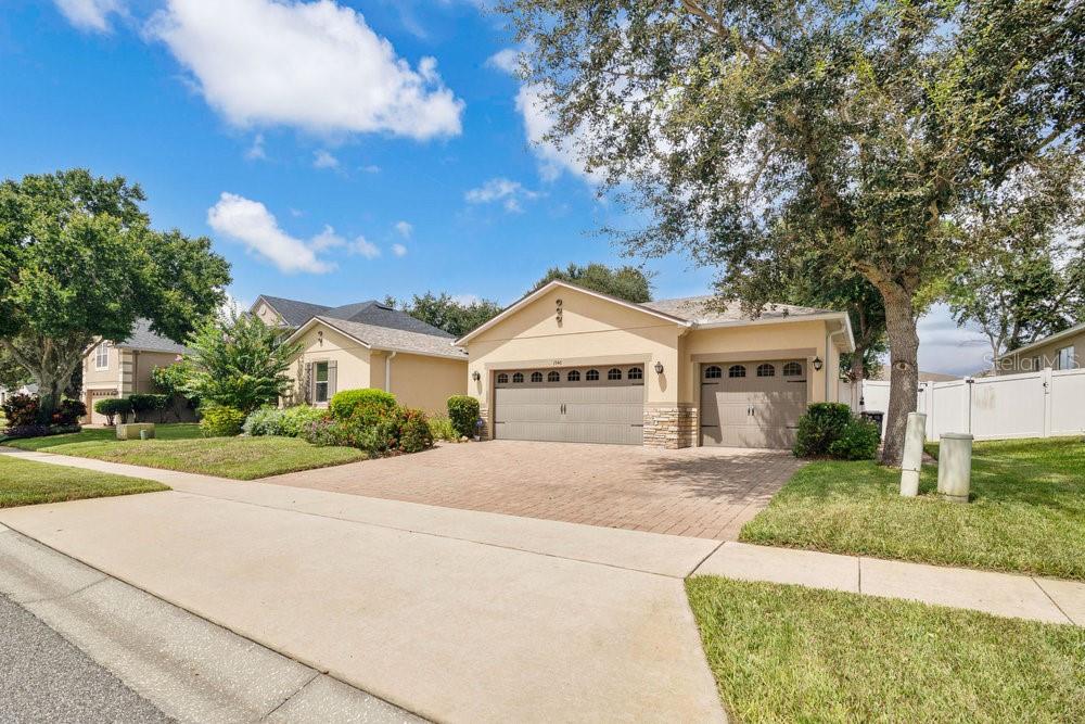 Stunning, Move-In Ready Home in Prime Apopka Location. Welcome to your dream home, a meticulously maintained 2012-built gem that offers the perfect blend of modern comfort and timeless style. With only one owner, this 3-bedroom, 2-bathroom residence offers a thoughtful split floorplan, ensuring privacy and functionality. The spacious master suite is thoughtfully positioned on the opposite side of the house from the two additional bedrooms and a versatile office, ideal for remote work or a quiet retreat. Step inside to discover premium finishes throughout, including tile in wet areas, engineered hardwood flooring in the office, and high-end laminate flooring that flows seamlessly through the rest of the home. The open family room creates a warm and inviting space for gatherings, while the 3-car garage provides ample storage and convenience. The fully fenced yard offers security and space for outdoor enjoyment, and the screened back lanai is a true highlight, featuring a super-sized hot tub perfect for lap swimming or entertaining a dozen of your closest friends. This home is truly move-in ready, with a 2-year-old HVAC system and roof ensuring peace of mind for years to come. Why wait 6–12 months for new construction when this home offers better value with premium upgrades already in place? Save time, money, and hassle with a property that’s ready for you to call home today. Nestled in a prime location next to SR-429, you’re just minutes from downtown, Sanford, Winter Garden, and Clermont, with everyday conveniences like Publix and Kelly Park Crossing close by. A short drive up SR-441 brings you to the charming shopping, dining, and holiday festivities of Mt. Dora, Eustis, and Tavares. Plus, Apopka’s natural beauty shines with nearby outdoor treasures like Lake Apopka and Wekiwa Springs State Park, offering endless opportunities for adventure and relaxation. Don’t miss your chance to own this beautifully upgraded home! Be sure to explore both virtual tour links for a detailed walk-through and video tour of the property. Schedule your showing today and experience the perfect combination of modern luxury, convenience, and Central Florida charm!