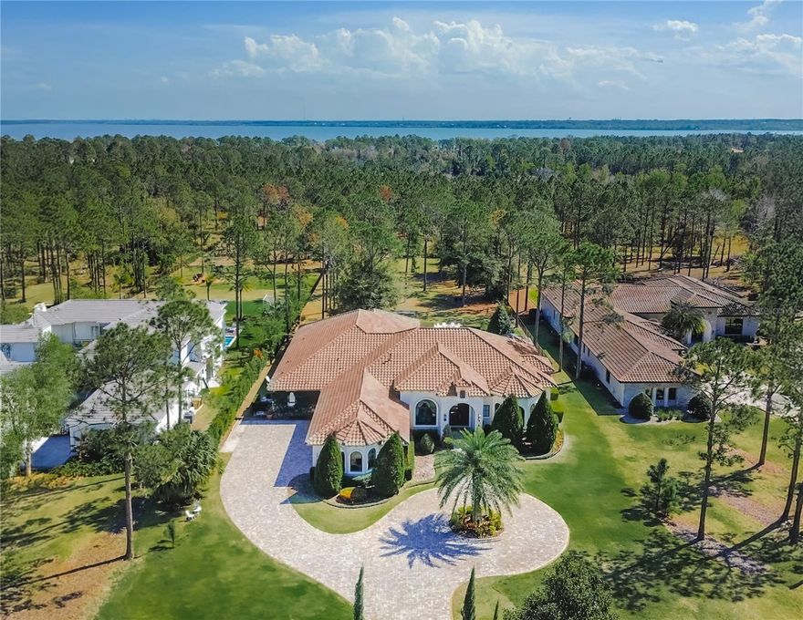 Beautifully modern and luxurious estate home located in dreamy Bella Colina, a golf and lakefront community, featuring an epic club house, a vast number of amenities including an onsite Spa & Salon, dining at their very own 19th Hotel Restaurant, a Nick Faldo-designed golf course, and much more! This stunning former model home will leave you speechless with its European style architecture, modern kitchen featuring granite countertops, custom cabinets, stainless steel appliances, with nothing less than the ample view of the home’s very own pool and jacuzzi. The living area is ample and spacious, with many spaces around the home to customize to your liking as shared areas, tv rooms, game rooms and more! The home features a 1 acre lot with lush greenery, pine trees and breathtaking gorgeous sunset views that you can enjoy as you relax in your beautiful pool! This home is true gem!