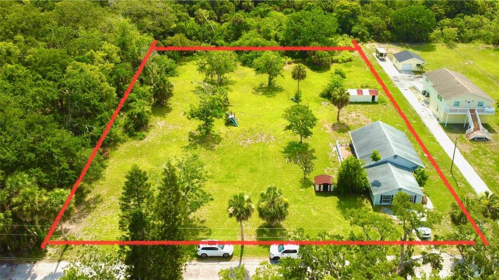Photo of 14318 Guava Street, Hudson, FL 34667 (MLS # TB8390068)