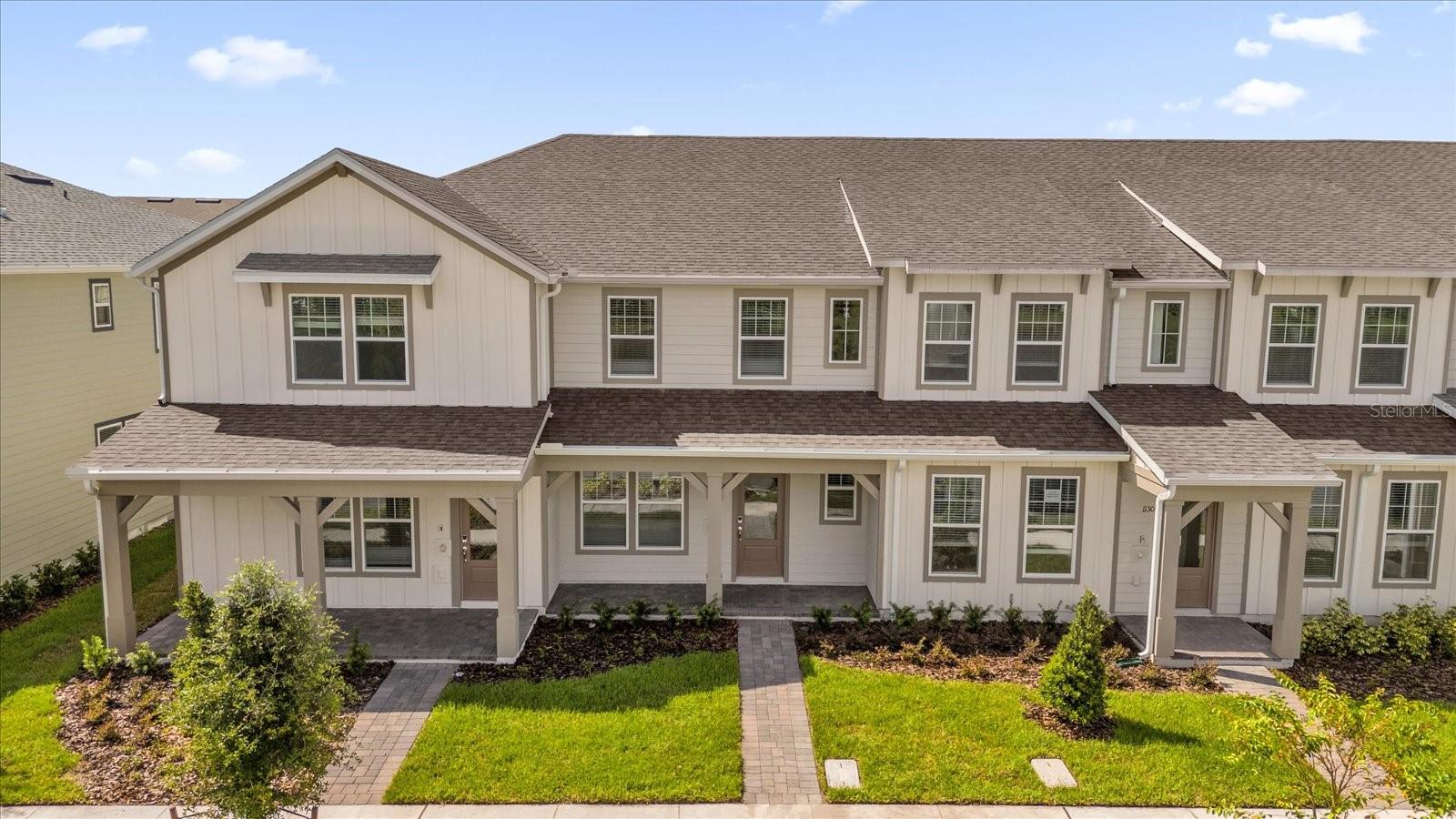This stylish, never-lived-in townhome in Cove at Nona Sound offers the perfect blend of comfort, convenience, and modern living—all in the heart of Orlando’s vibrant Lake Nona area. Step inside to find a thoughtfully designed open floor plan where the living room, dining space, and kitchen flow seamlessly together. The kitchen features stainless steel appliances, quartz countertops, and sleek white soft-close cabinetry. Just off the main level, a two-car garage with epoxy flooring and smart garage access adds convenience to your lifestyle.
Upstairs, a versatile loft provides flexible space for a home office, playroom, or cozy second lounge. The primary suite is a retreat of its own with serene water views, a spacious walk-in closet, and a spa-inspired bath with double vanities and a walk-in shower. Two additional bedrooms share a full bath with tub-shower, while the conveniently located laundry room, with washer and dryer included, makes life effortless.
Living here means more than just a beautiful home—it’s a lifestyle. Enjoy access to the community pool and playground, all while knowing that landscaping, exterior maintenance, and even high-speed internet with streaming channels are included in the rent. Move-in ready and waiting for its very first residents, this townhome combines modern design with easy living in one of Orlando’s most desirable communities.
