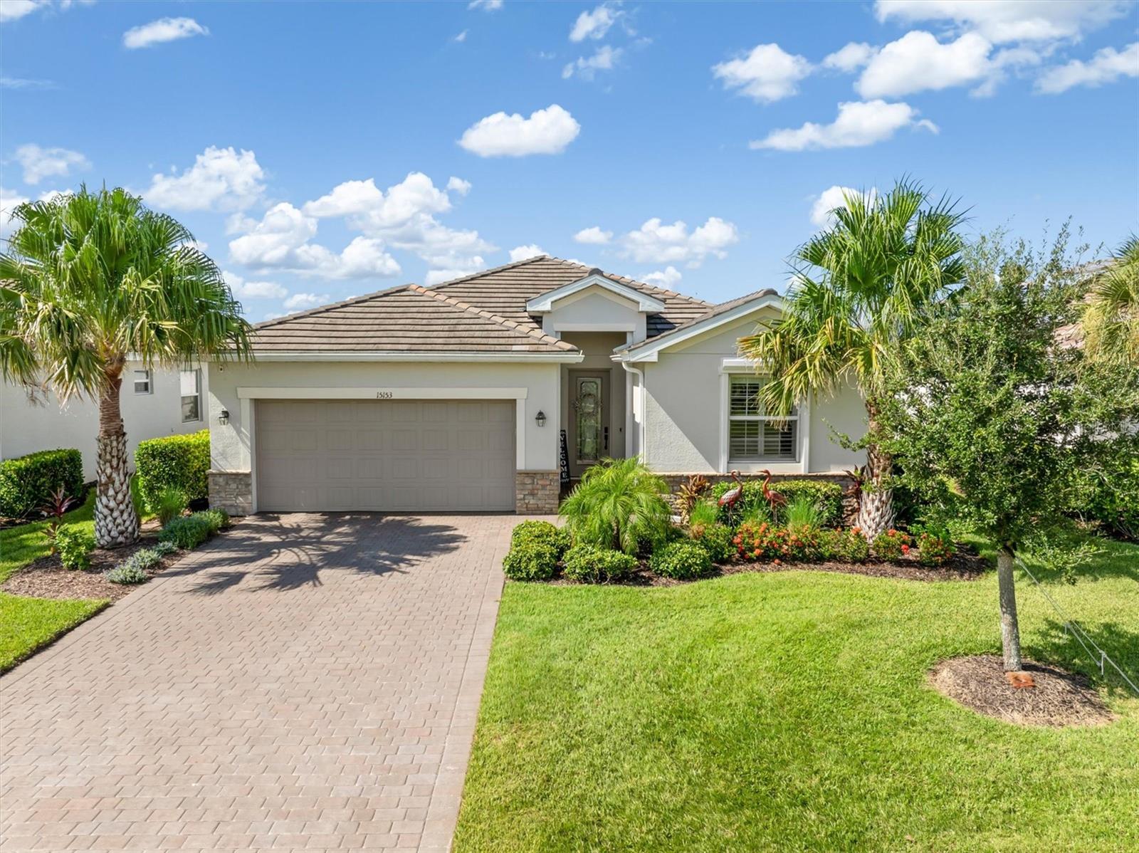 DISCOVER FLORIDA LIVING at its best in this 2019-built 4 bed, 3 bath POOL home located on a quiet street within one of the area’s best-kept secrets—an exclusive gated community of just 165 newer homes, all with water views and tile roofs.
Step inside to a bright and spacious open floorplan with high ceilings, diagonal tile flooring, plenty of storage and 3-way split for the bedrooms allowing flexible uses including office, hobby room or guest suite. The kitchen features white shaker-style cabinets, granite countertops, large granite island, upgraded stainless steel appliances, and flows seamlessly into the dining room and family room, where sliding glass doors lead to your private oasis—a SCREENED POOL AND SPA with covered lanai with pavers, overlooking a tranquil lake with privacy hedges and mature landscaping. Enjoy watching the wildlife from the lanai and the spectacular Florida sunrise and sunsets from this south-facing home.
Owners have added California-style closets, plantation shutters, designer lighting and fans and upgraded appliances.
For maximum peace of mind, the home has whole-house STORM SHUTTERS (roll-down at front and back, storm screens on sides) and a transferrable Flood Insurance policy, currently $900/yr.
Harbor West is a low-HOA community which offers 2 gated entrances, sidewalks, lawn and landscape maintenance, and an active social scene—perfect for both seasonal and full-time residents. All homes back onto lakes or Gulf-access canals and are well spaced, with room on paver driveways for visitor parking and all homes have public water, no septic. The location is a short drive to local beaches in Boca Grande or Englewood and the area offers boating, fishing, golf, shopping, dining and Spring Training baseball for the Rays and Braves. You will have easy access to I-75 for Sarasota, Fort Myers, and Tampa.
Don’t miss this rare opportunity to enjoy a relaxed lifestyle in one of Southwest Florida’s most unspoiled locations. The perfect opportunity to escape from Winter weather and make the most of living in Florida!