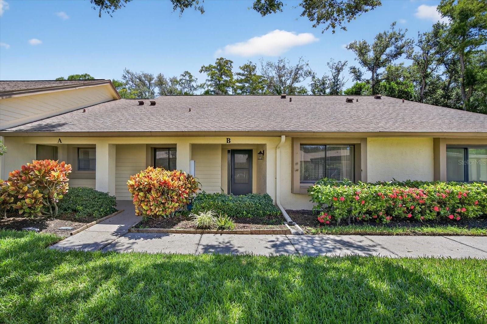 Tucked away in a quiet, age-restricted community just minutes from the heart of downtown Dunedin, this two-bedroom, two-bath condo is brimming with potential and waiting for your vision. Yes, it needs a full renovation—but with its peaceful water view, split bedroom plan, inside laundry room, and spacious Florida room, the bones are already in place for something truly special. Some other redeeming qualities of this home include a NEW AC system (2024), a generous primary bedroom with walk-in closet and ensuite bathroom, and a one-car carport which keeps your vehicle cool and shaded year-round. The Village on the Green community offers a heated community pool, clubhouse and shuffleboard for your enjoyment. Whether you’re dreaming of a cozy winter retreat or a fresh canvas for your retirement living design ideas, this location can’t be beat—close to local beaches, charming downtown Dunedin, Countryside shopping, endless choices for dining, and everything that makes this area so popular. Roll up your sleeves and reimagine this space into your perfect Florida escape.Tucked away in a quiet, age-restricted community just minutes from the heart of downtown Dunedin, this two-bedroom, two-bath condo is brimming with potential and waiting for your vision. Yes, it needs a full renovation—but with its peaceful water view, split bedroom plan, inside laundry room, and spacious Florida room, the bones are already in place for something truly special. Some other redeeming qualities of this home include a NEW AC system (2024), a generous primary bedroom with walk-in closet and ensuite bathroom, and a one-car carport which keeps your vehicle cool and shaded year-round. The Village on the Green community offers a heated community pool, clubhouse and shuffleboard for your enjoyment. Whether you’re dreaming of a cozy winter retreat or a fresh canvas for your retirement living design ideas, this location can’t be beat—close to local beaches, charming downtown Dunedin, Countryside shopping, endless choices for dining, and everything that makes this area so popular. Roll up your sleeves and reimagine this space into your perfect Florida escape.