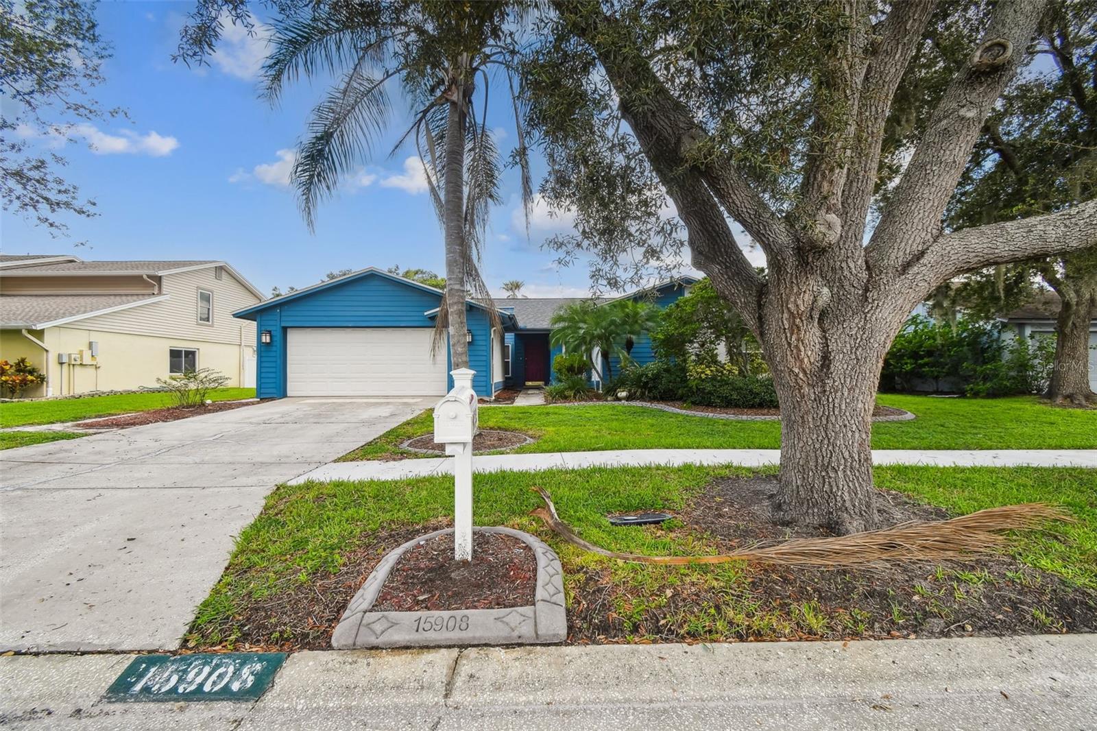 Tucked away on a beautiful tree lined cul-de-sac in lovely Carrollwood and in a well established neighborhood, this inviting pool home offers the perfect blend of comfort, space, and location. You're welcomed with beautiful landscaping and nice curb appeal. Inside, you'll find a spacious layout filled with 4 bedrooms, 2 bathrooms natural light, vaulted ceilings and a kitchen designed for both function and style—featuring abundant storage, beautiful granite countertops, a center island, and plenty of workspace for everyday cooking or entertaining. The large primary bedroom has two closets, sliders to the back pool area and an en-suite bathroom with a large step in shower. Step outside to your private fully fenced backyard oasis with a sparkling pool, ideal for weekend fun or peaceful evenings. Located in a top-rated school district and surrounded by mature landscaping. Both the Roof & the AC were replaced in 2021 and the windows in 2017. This property is a must see!