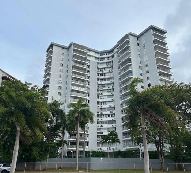 Step into luxury with this beautifully renovated 8th floor apartment located in the trendy and exclusive Miramar neighborhood. Offering breathtaking postcard views of the Condado Lagoon from the balcony, living room, and kitchen. This home is perfect for those who value both style and comfort. This spacious unit was originally designed with 3 bedrooms but has been transformed into 2 bedrooms plus an open space room that can be used as a home office, playroom, or guest area. The apartment features 2 full bathrooms, a fully equipped island kitchen and is air conditioned throughout. You'll enjoy the convenience of 1 basement parking space and access to luxury amenities including a swimming pools, fitness center, activity-meeting room, terrace and 24/7 security. FULL POWER GENERATOR! Don't miss your chance to live in one of San Juan's most sought-after locations. Schedule a viewing today!