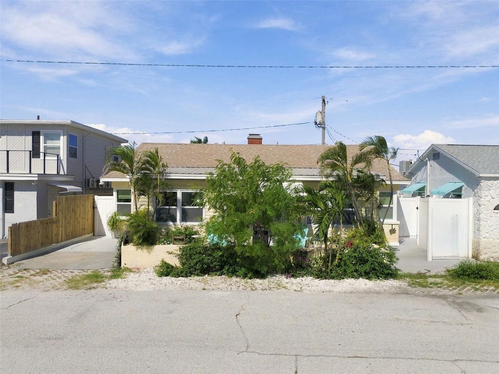 Photo of 78 146th Avenue E, Madeira Beach, FL 33708 (MLS # TB8559356)