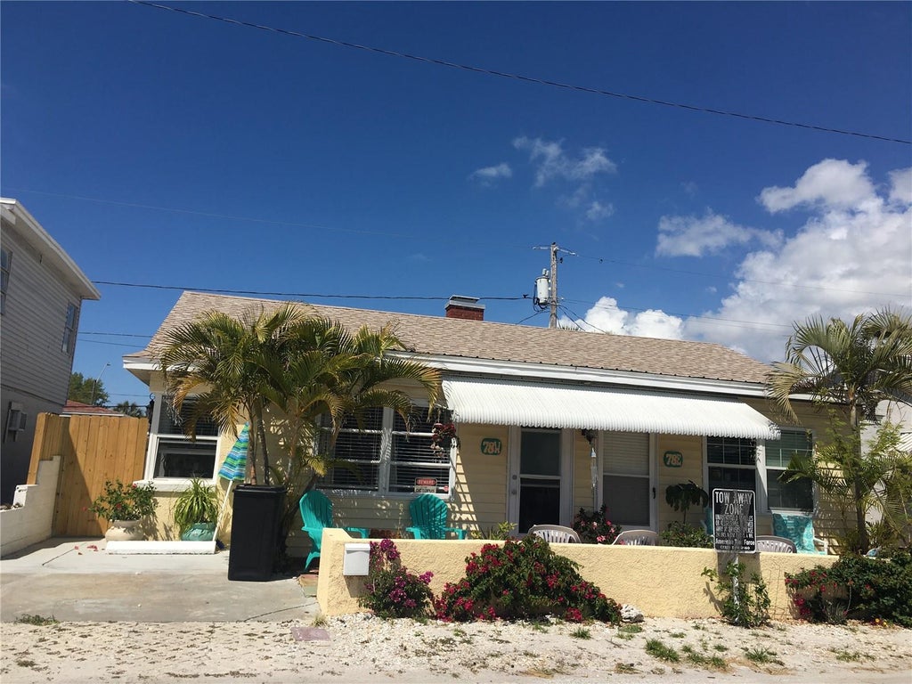 Photo of 78 146th Avenue E, Madeira Beach, FL 33708 (MLS # TB8559356)