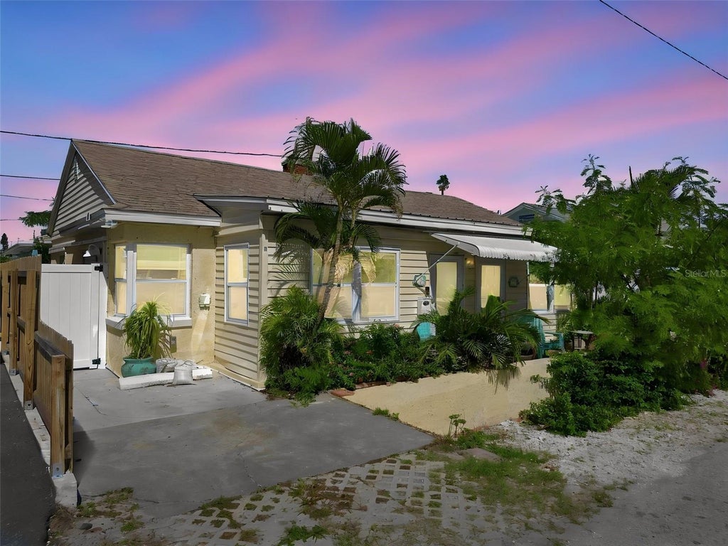 Photo of 78 146th Avenue E, Madeira Beach, FL 33708 (MLS # TB8559356)