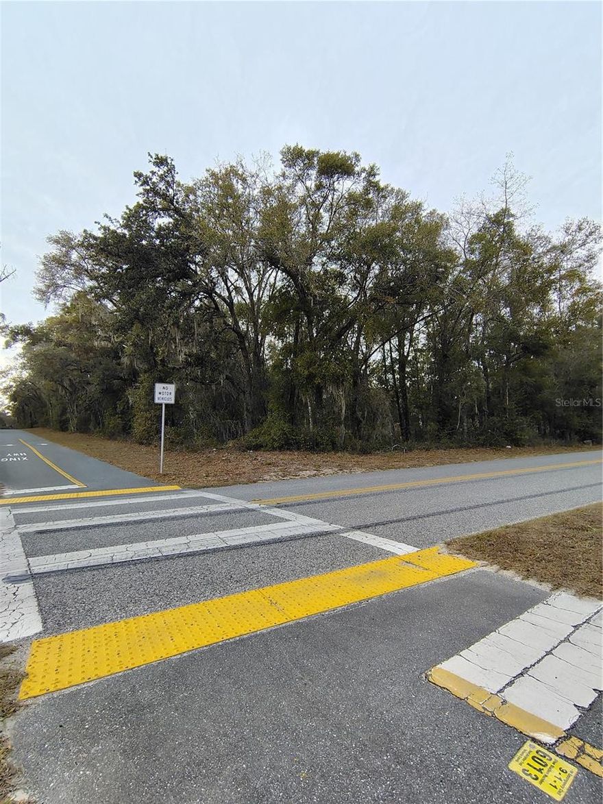 Discover the perfect opportunity to build your dream home on this expansive 2.20-acre corner property in the peaceful and highly desirable Brooksville area. This listing includes Lot 1 (Key #364634 – 1.20 acres) and Lot 2 (Key #1799968 – 1 acre) being sold together.

This beautiful corner lot provides excellent visibility and flexibility for future development. Enjoy direct access to a nearby walking trail, ideal for outdoor enthusiasts who appreciate nature right outside their door. With no HOA, no flood zone, and plenty of space to design your ideal layout, this property offers freedom and peace of mind.

Whether you're looking to build a private residence, create a multi-structure setup, or invest in land with strong long-term potential, this location checks all the boxes. Conveniently situated near local amenities while still offering a quiet, rural feel this is a rare find in Brooksville.

Key Features:

2.20 acres combined (two parcels sold together)

Corner lot with excellent access

Adjacent to a scenic walking trail

No HOA restrictions

No flood zone

Ideal for building or investment