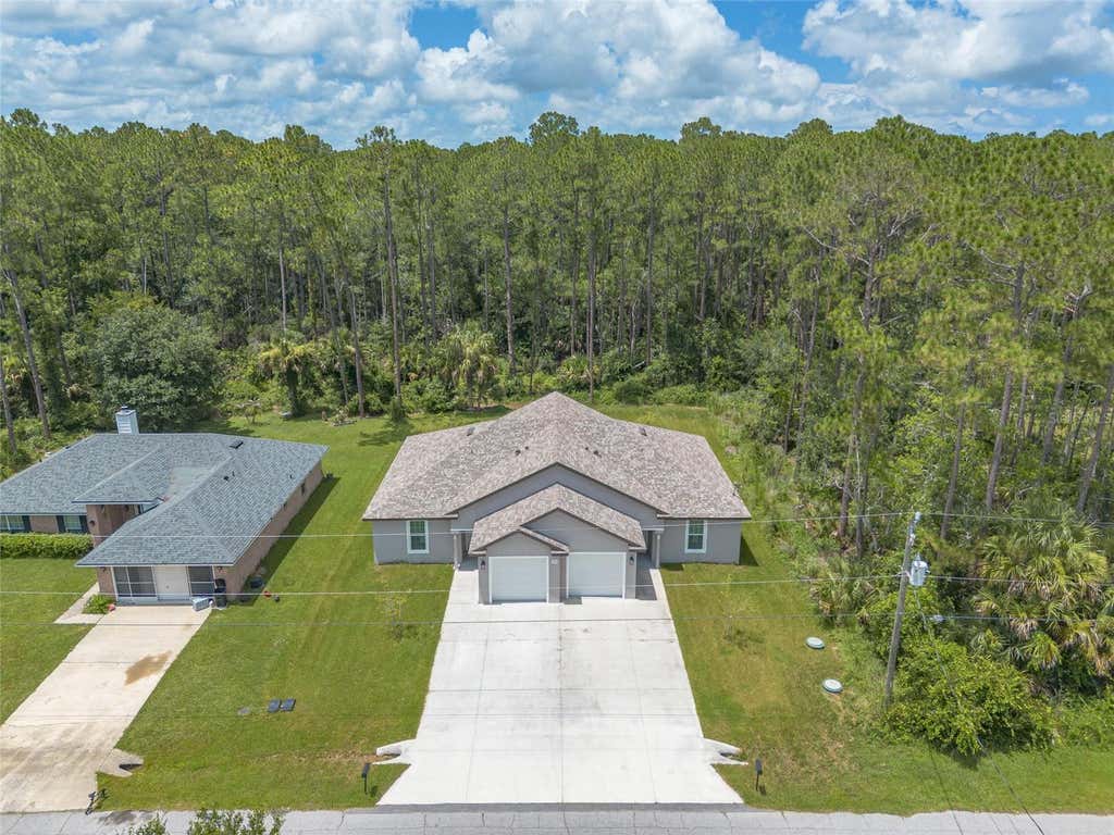Photo of 48 Regency Drive, Palm Coast, FL 32164 (MLS # V4950271)