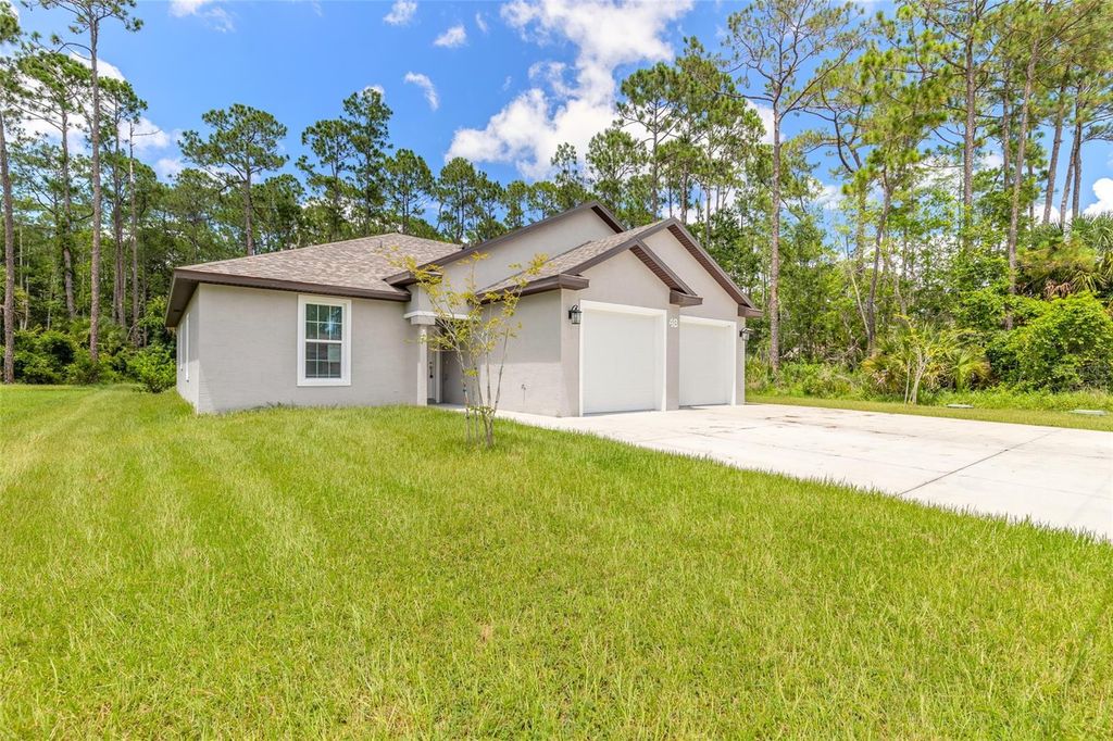 Photo of 48 Regency Drive, Palm Coast, FL 32164 (MLS # V4950271)