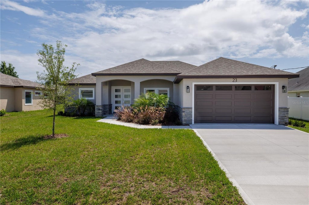 Photo of 10 Rainer Place, Palm Coast, FL 32164 (MLS # FC320053)