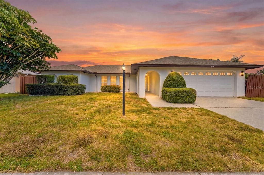 Photo of 10711 Francis Ln, Largo, FL 33774 (MLS # TB8523132)