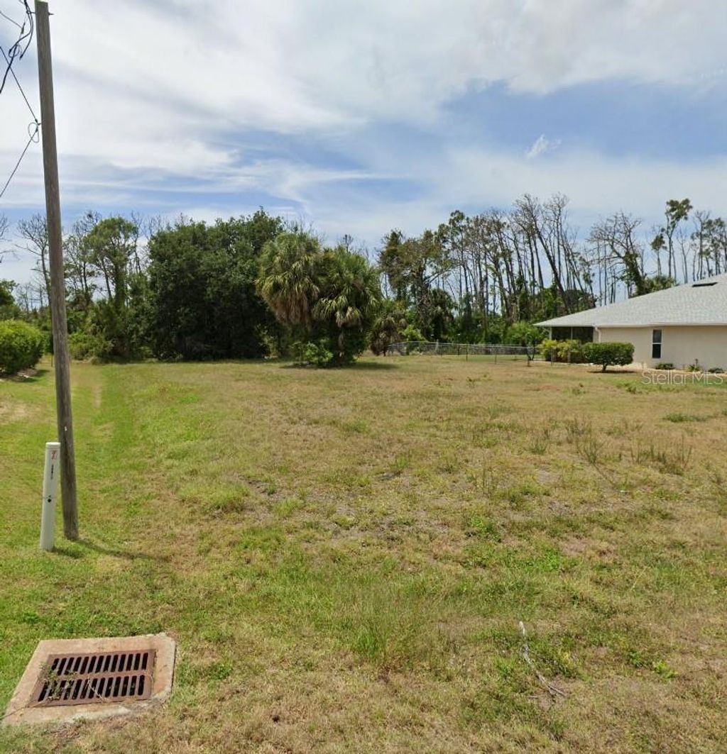 Photo of 204 Fairway Road, Rotonda West, FL 33947 (MLS # D6146444)