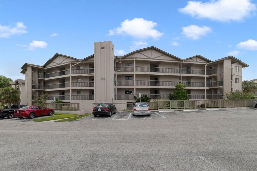 Fabulous 2 Bedroom, 2 Bath Condo with Stunning Lake Lotus View – Largest 2BR Floor Plan in the Community! This spacious, move-in-ready unit features a split floor plan, open living and dining areas, and a private screened balcony overlooking serene Lake Lotus. Upgrades include  waterproof Luxury SCP flooring throughout, quartz countertops, stainless steel appliances, modern undermount sink with updated faucet, and stylish gold hardware. Designer  kitchen cabinets add a custom feel, and a functional entryway drop zone with seating adds convenience. Additional features: washer and dryer, keyless smart lock, neutral interior paint, and a Elevator in building. Enjoy resort-style amenities including a swimming pool, tennis courts, , and lake access—bring your kayak and fishing gear! Prime location near major roads, shopping, dining, Cranes Roost Park, Wekiva Springs, and bike trails. Zoned for Lake Brantley High School.  Seller is motivated to sell - she is offering $5,000 Towards Closing cost/down payment assistance.