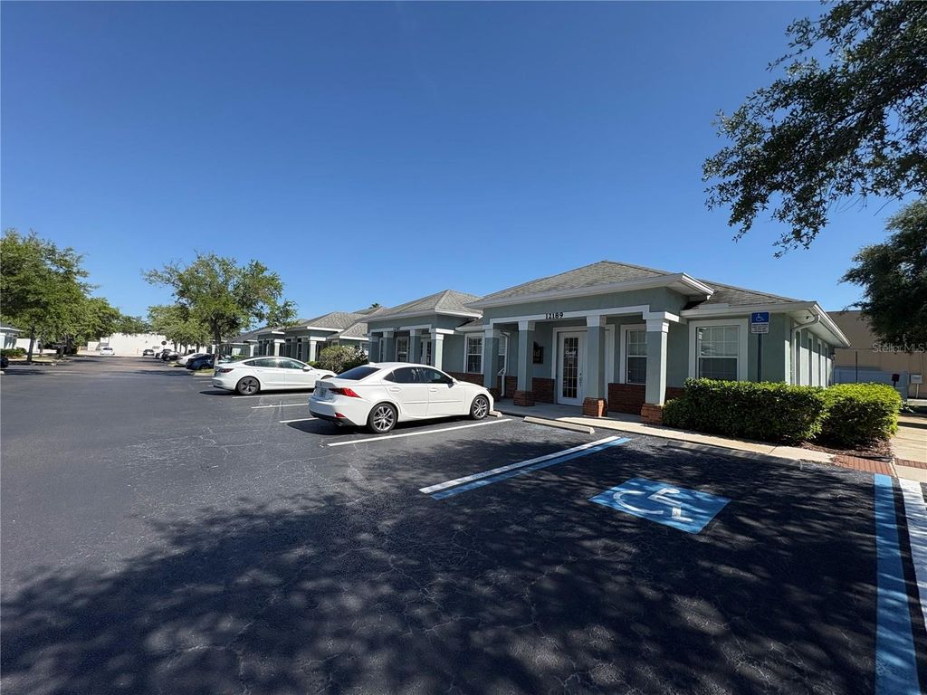 Photo of 12187 W Linebaugh Avenue, Tampa, FL 33626 (MLS # TB8516540)