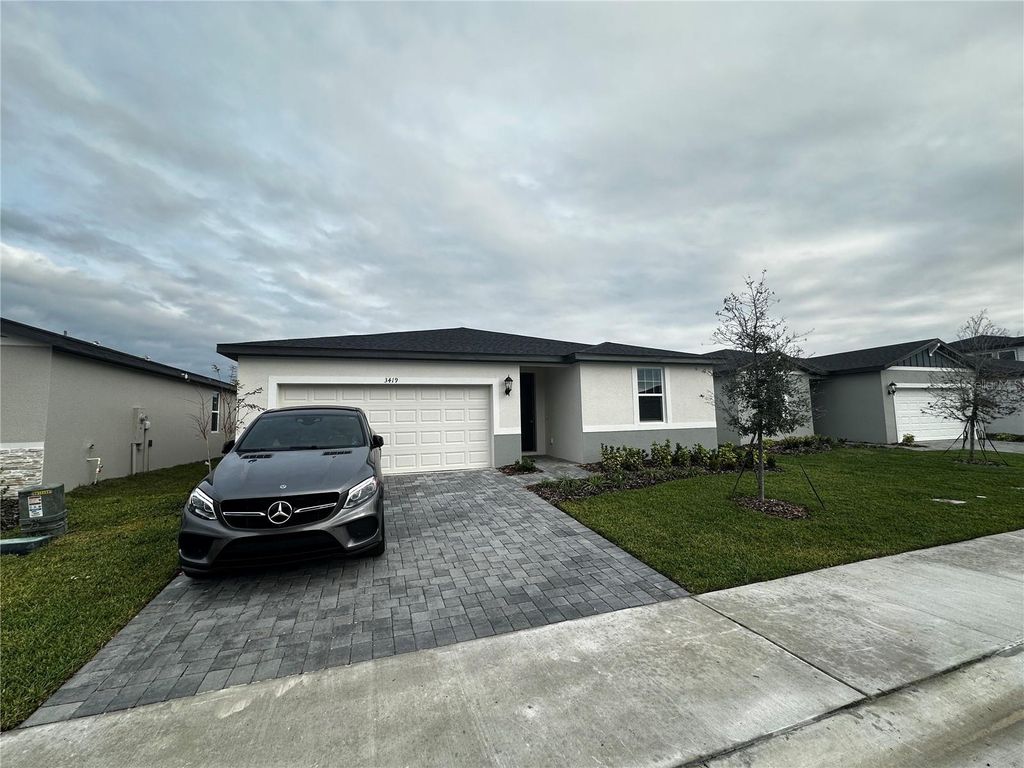 Photo of 3419 Mud Canyon Drive, Davenport, FL 33837 (MLS # O6374258)