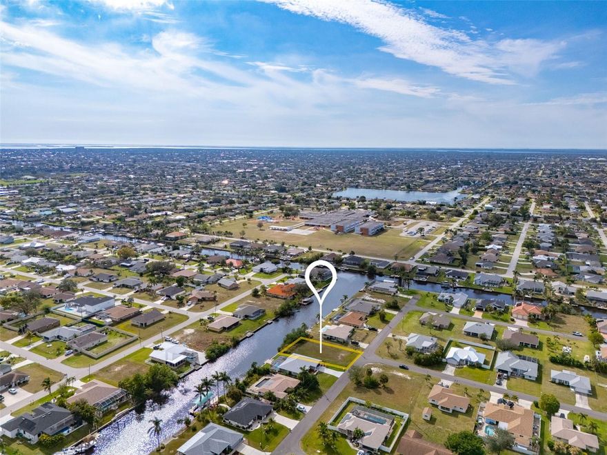 Are you looking for the perfect property to build your dream home on? Look no further! This GULF ACCESS lot is located in a desirable neighborhood in SW Cape Coral! Perfect to build your dream home or vacation home. Centrally located near Publix, Target, multiple restaurants, less than 10 minutes to downtown Cape Coral, right next to Pelican Elementary, Challenger middle school, Cape High School, etc! The property is right next to Pelican Blvd which is known for going all out on Halloween! City water and sewer assessments are PAID OFF!! The vacant lot is 10,001 sqft. The opportunities are endless.