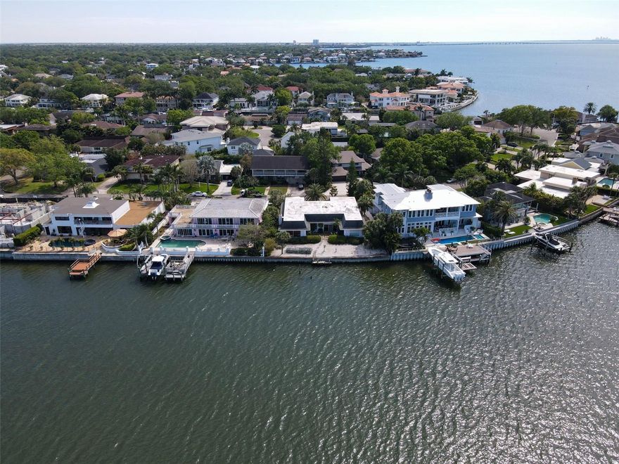 Waterfront property with incredible North & Northwest views! Buildable 1/4 acre lot on deep water in Bay Way Isles. 100 ft of water frontage. Located in a quiet neighborhood with several new construction projects around the corner.