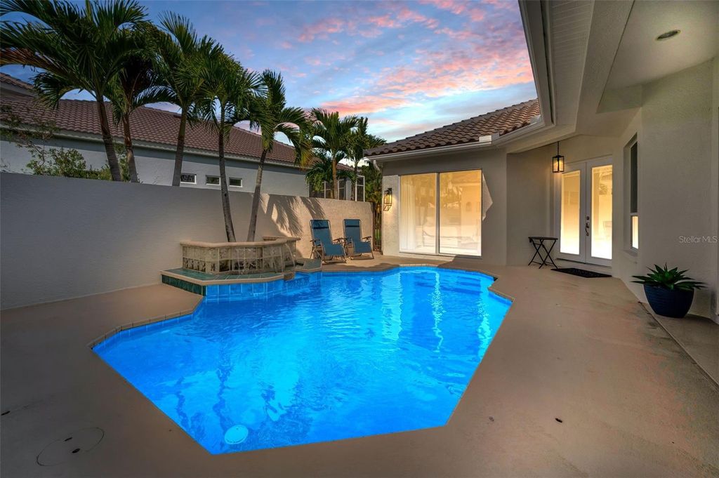 Photo of 9952 Sago Point Drive, Largo, FL 33777 (MLS # TB8465979)