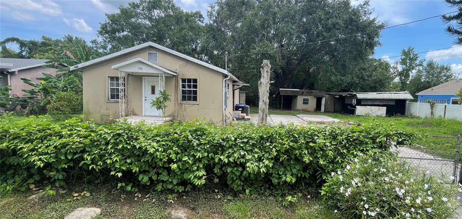 2-bedroom, one bath, and utility sheds. Conveniently located close to shopping and major highways. Excellent for investment or as a primary home. No HOA. Room measurements are approximate and need to be verified by the buyer.