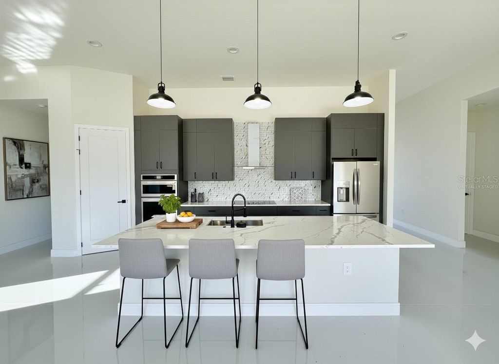 Photo of 267 Santa Marta St, Port Charlotte, FL 33954 (MLS # O6362578)