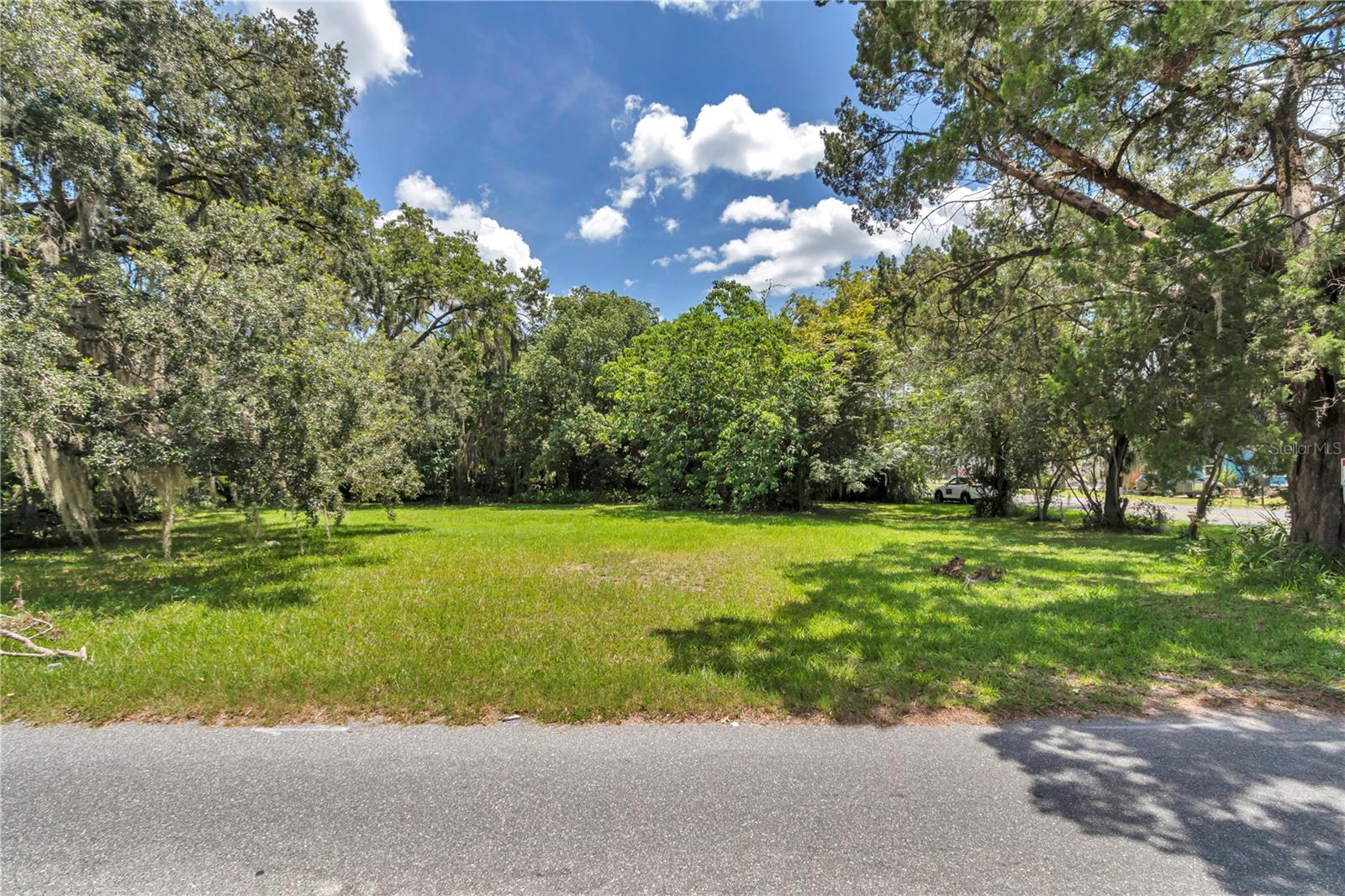 This cleared and level 0.29-acre corner lot has a great location, just one block from the busy South Pine Ave/US-301 commercial corridor in Ocala. Zoned B-1A (Neighborhood Business District), this property offers a unique opportunity for a variety of uses, including retail, professional office space or develop a mixed use commercial/residential space. Well established nearby businesses include Papernet Advertising, Meldon Law, Doctors Urgent Care, Healthwell Pharmacy, A-1 Tire, Statefarm, and Advent Health Hospital. Some of the permitted zoning uses include: Retail Stores: Bakery, Hardware, Home decorating, Specialty retail, Business Service Parking lot, Eating Establishment, Antique gallery, Art gallery, Museum, Business Office, Laundry and Dry cleaning, Hair Salon, Church, Day care facility, Library, Dance/Art/Music studio, Physical Fitness Center, Medical or Dental office, Veterinarian office, Community residential home, Single family or two-family residential dwelling, and more. Whether you're planning a retail storefront, professional office space, or a blend of commercial and residential use, this property provides the flexibility to bring your vision to life in one of Ocala's business district areas.