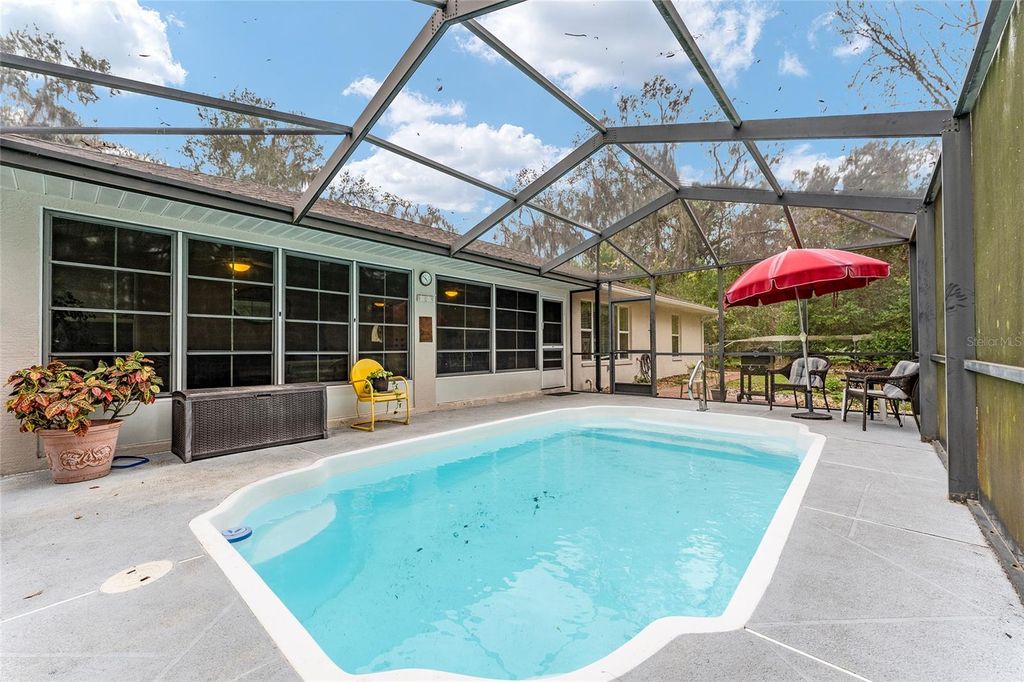 Photo of 84 S Hunting Lodge Drive, Inverness, FL 34453 (MLS # OM716764)