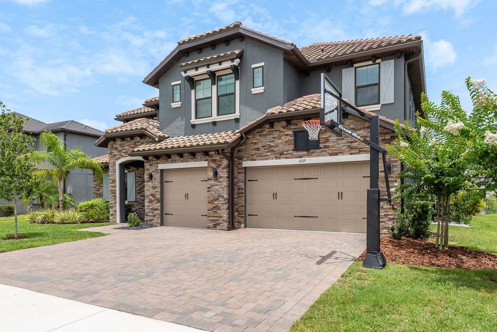 Photo of 6109 Marsh Trail Drive, Odessa, FL 33556 (MLS # TB8393272)