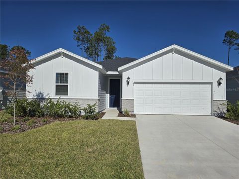 Photo of 49 Wandering Creek Way, Palm Coast, FL 32164 (MLS # O6343737)