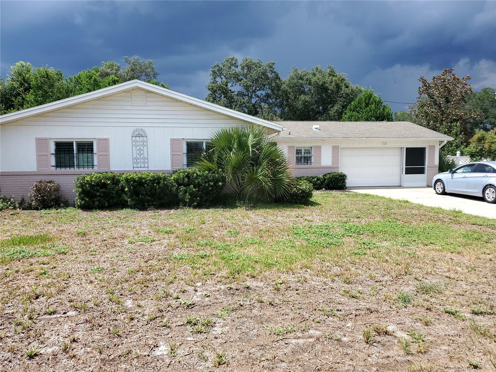 INVESTOR ALERT! NOT YOUR NORMAL "FLIP" OR INVESTMENT PROPERTY...FANTASTIC CONDITION... BUT THE SELLER WANTS OUT QUICKLY AND IS REQUESTING CASH OFFERS ONLY.....EXPECTING MULTIPLE OFFERS AND THE SELLER IS ASKING FOR HIGHEST AND BEST BY NOON, TUESDAY AUGUST 12TH.... PLEASE SEE CONTRACT INSTRUCTIONS IN THE REALTOR REMARKS. No carpet in this one... ceramic tile and wood laminate flooring throughout. There is a large dining area with a built-in sideboard, and other additional cabinets... all overlooking the spacious living room and the big screened rear porch and the fenced backyard. The A/C is only 3 years old, the electrical panel has been upgraded, and the windows have been upgraded and replaced. All the appliances, including the newer washer and dryer stay with the house. The roof is believed to have been replaced in 2006, but appears to be water tight and in good shape. This home is priced way below market value for a quick sale! Make your appointment with your cash buyers today.