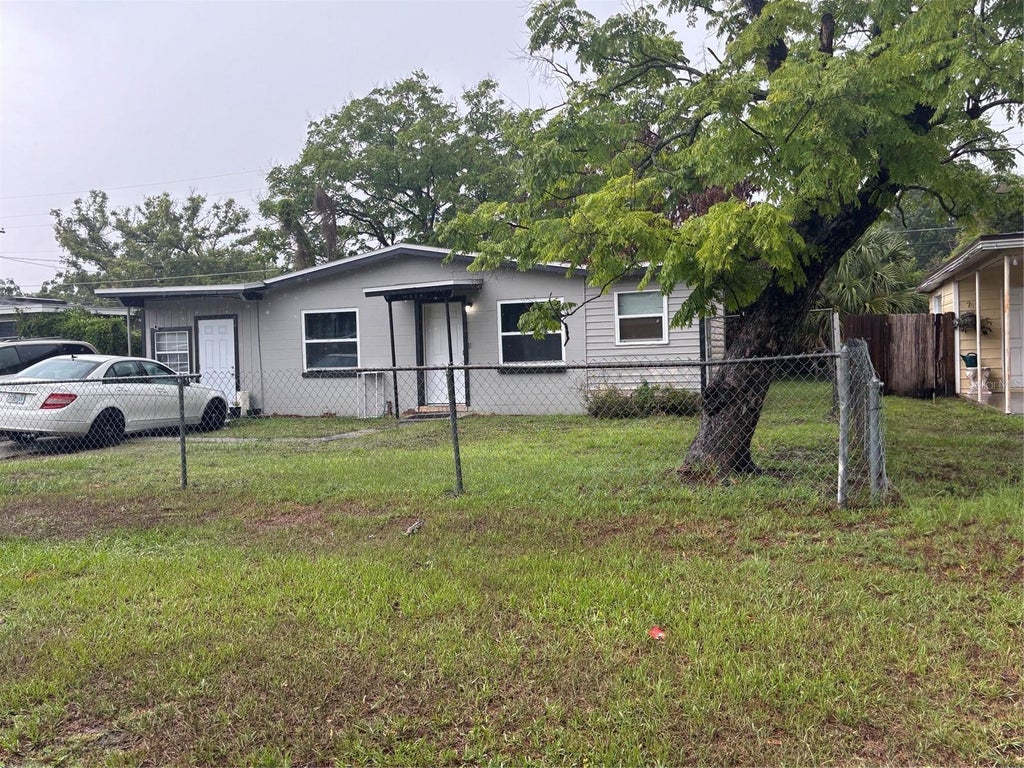 Photo of 4321 Lake Lawne Avenue, Orlando, FL 32808 (MLS # O6415732)