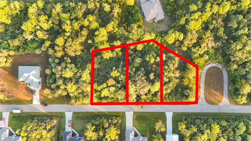 Discover the perfect blend of peace, privacy, and proximity on Sawyer Circle in North Port. This spacious three-lot parcel totals over 0.8 acres and offers more than 350 feet of road frontage, giving you flexibility and room to create your ideal Florida retreat. The property already benefits from electric, city water, and sewer access available at the road, making it a prime homesite or investment opportunity with excellent infrastructure in place. 

Set in a quiet, natural setting surrounded by native Florida landscape, this location offers a true sense of seclusion while remaining just minutes from Interstate 75 for quick access north or south. Shopping, dining, and essential services are all nearby, ensuring convenience without sacrificing tranquility.

Just a short drive away lies Warm Mineral Springs Park, Florida’s only naturally occurring warm spring. Constantly flowing at a soothing 85°F, the spring is rich in over 50 minerals and is renowned for its natural therapeutic and restorative qualities. Visitors from around the world come to experience its relaxing waters and explore its remarkable history, including archaeological findings dating back more than 10,000 years.

Outdoor enthusiasts will appreciate easy access to North Port’s network of freshwater canals, parks, and nature trails. And when you’re ready to enjoy the coast, Venice and Englewood Beaches are only 20–30 minutes away, offering pristine Gulf waters, boating, dining, and world-class sunsets.

Whether you’re looking to build your dream home, create a peaceful seasonal retreat, or secure a long-term investment, 000 Sawyer Circle combines size, location, and natural beauty — delivering the best of both worlds: quiet seclusion with close-by amenities and the Gulf Coast lifestyle.