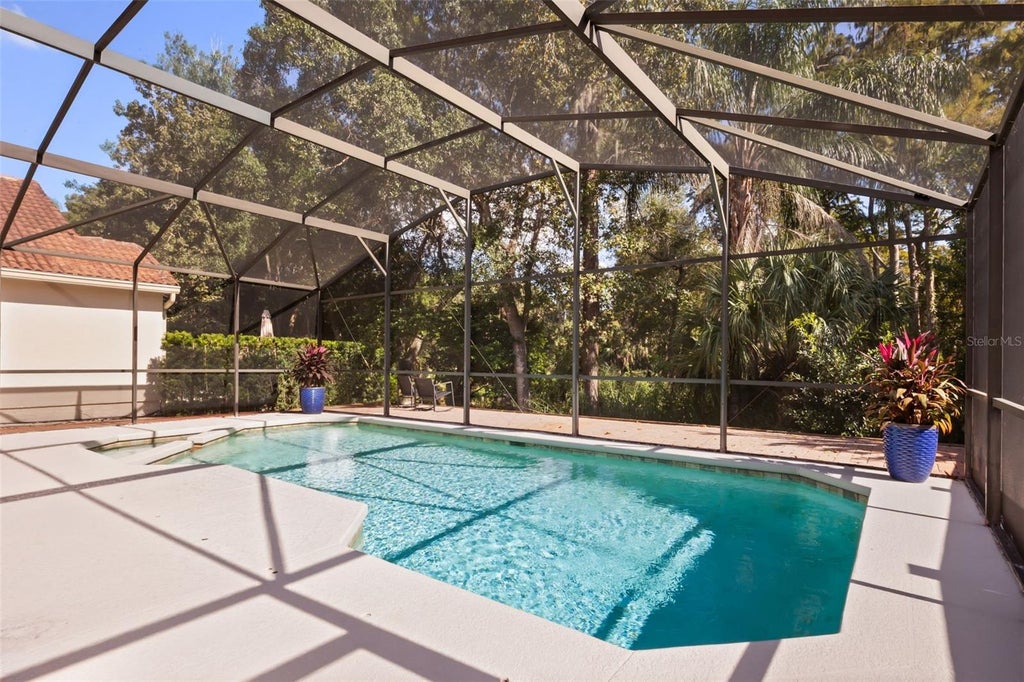 Photo of 1314 Augusta National Boulevard, Winter Springs, FL 32708 (MLS # O6448720)