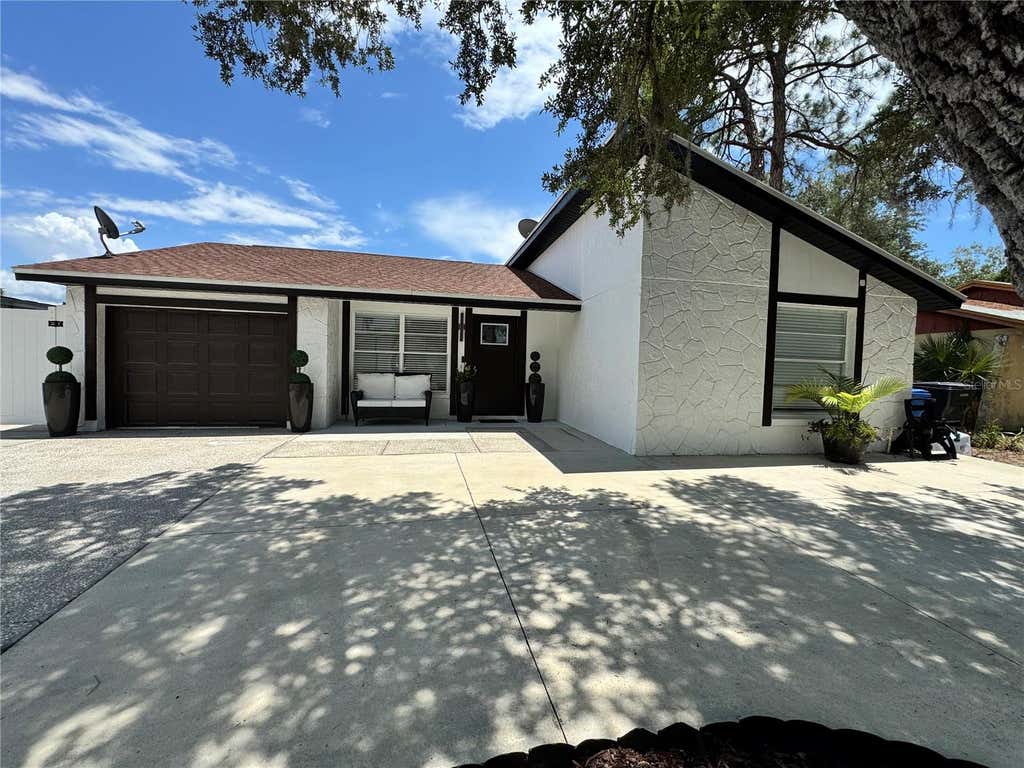 Photo of 10114 Briarwick Court, Tampa, FL 33615 (MLS # TB8518261)
