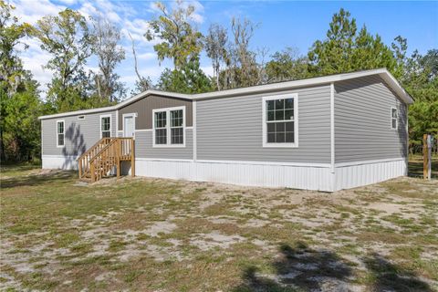 Photo of 16077 Bradenton Street, Brooksville, FL 34604 (MLS # W7882335)
