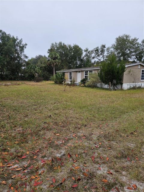 Photo of 130 Sesame Street, Palatka, FL 32177 (MLS # OM714686)