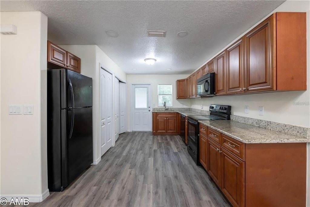 Photo of 9374 N Peachtree Way, Citrus Springs, FL 34434 (MLS # OM720472)