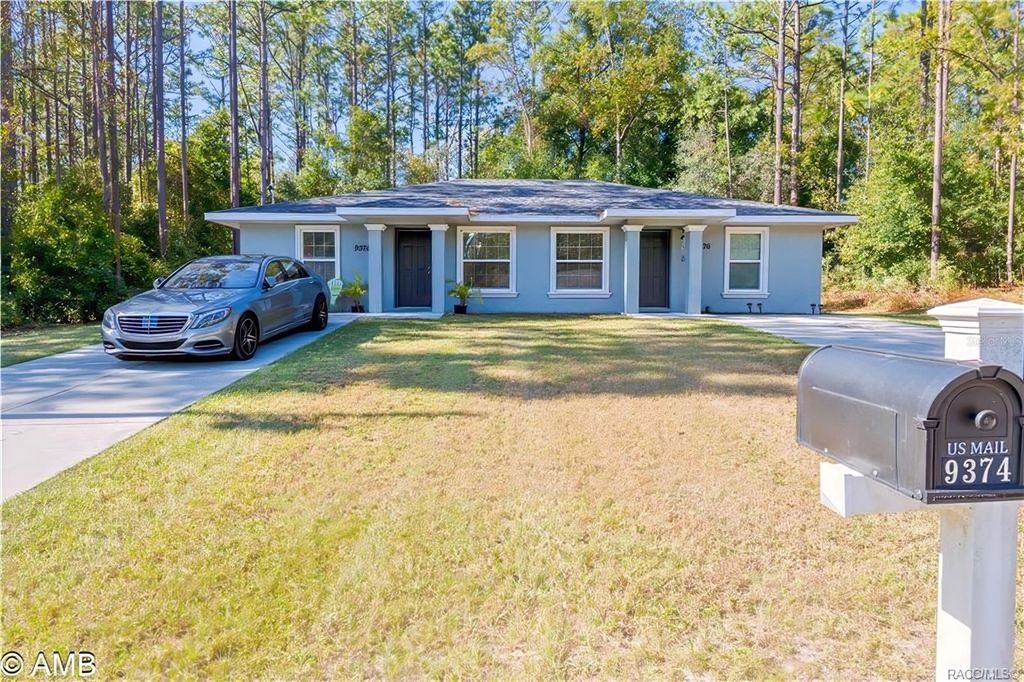 Photo of 9374 N Peachtree Way, Citrus Springs, FL 34434 (MLS # OM720472)