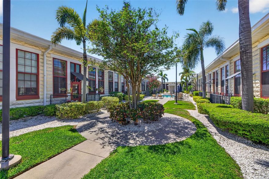 Under contract-accepting backup offers. A refined take on industrial, city living! Welcome to this expansive 1-bedroom, 1.5-bath loft with versatile FLEX/OFFICE space at the iconic Box Factory Lofts, one of Tampa’s most architecturally distinctive and historically rich residential communities. This south-facing unit with 2024 AC and newer roof overlooks 2nd Avenue, where natural light pours in and Ybor’s historic charm becomes part of your everyday backdrop. Originally a cigar box manufacturing facility, this landmark property has been thoughtfully transformed into an exclusive collection of residences with resort-style community pool & courtyard that honor its heritage while embracing modern design. Inside, soaring ceilings, dramatic architectural lines, and upgraded, custom epoxy-finished concrete flooring create a clean, contemporary edge while preserving the industrial aesthetic. Exposed block walls, oversized windows with custom shades, and visible industrial ductwork add depth and texture throughout. The main living area flows seamlessly into a well-appointed kitchen featuring stainless steel appliances, generous cabinetry, and a sleek bar-top connection, ideal for both entertaining and everyday living. A thoughtfully positioned flex space upon entry offers the perfect setting for a home office or creative studio, complemented by a convenient guest powder bath. Upstairs, the custom lofted level creates a unique, almost treehouse-like retreat overlooking the living space below. This private escape features a spacious walk-in closet with custom built-in and a beautifully updated en-suite bath with double sinks & in-unit stackable laundry. Drive right up to your premium COVERED GARAGE corner parking space, another stand out and highly sought-after feature within the community. Additional amenities include secure key-fob access to the building for ultimate security, climate-controlled bike storage, and a covered parking garage, delivering both comfort and convenience. Positioned in the heart of Ybor City, you are just blocks away from acclaimed dining, craft breweries, coffee shops, live music, and boutique retail, along with easy access to the TECO Streetcar, Downtown Tampa, Water Street, 275, Crosstown, and the Riverwalk. With the continued growth of the nearby GasWorx development, this location offers not only convenience and fun, but a compelling long-term upside and top tier investment. More than a residence, this is your opportunity to own a statement in character, design, and location and be a part of Tampa’s evolving story.