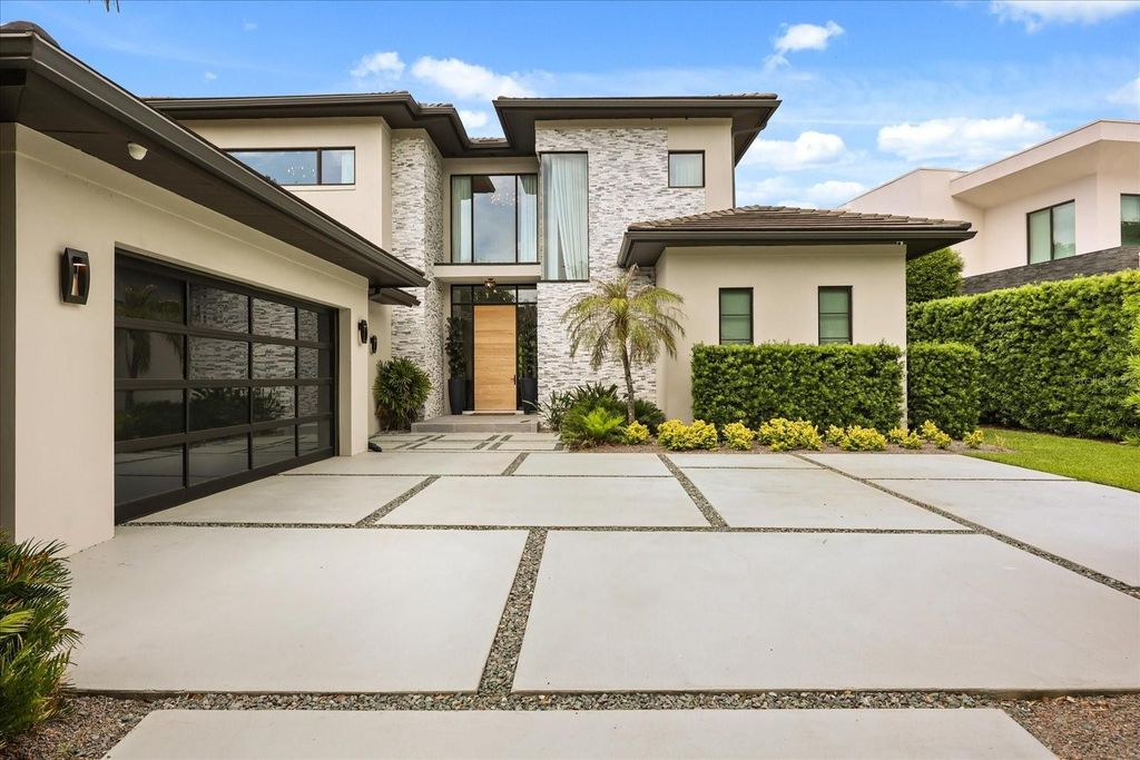 Photo of 10348 Kensington Shore Drive, Orlando, FL 32827 (MLS # O6402412)