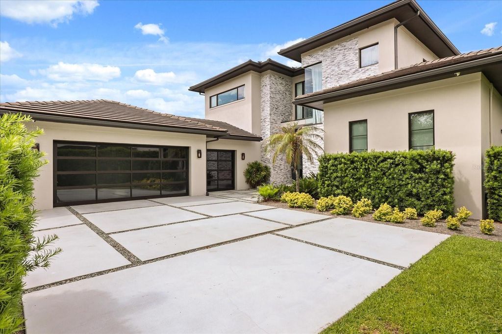 Photo of 10348 Kensington Shore Drive, Orlando, FL 32827 (MLS # O6402412)