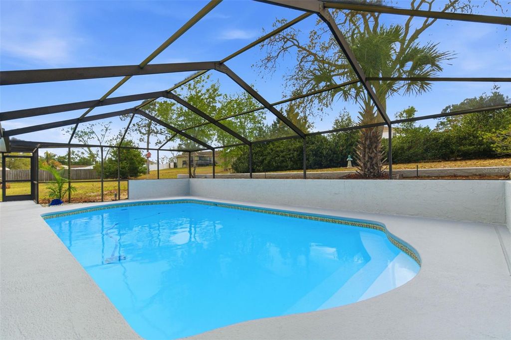 Photo of 5355 Tanner Road, Spring Hill, FL 34609 (MLS # TB8482807)