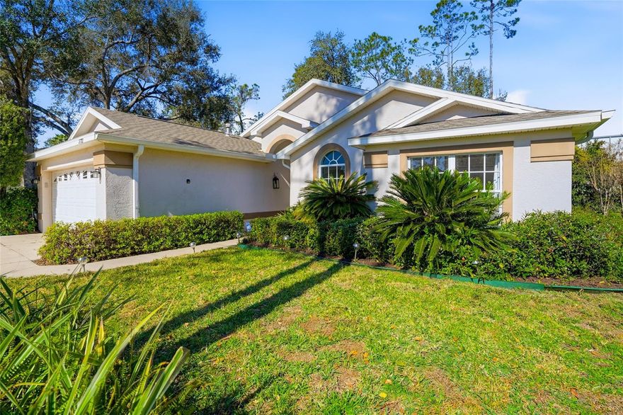 This single-story Wesley Chapel home features two bedrooms, two bathrooms, and an office. Granite countertops finish the bathrooms. The office provides space for work or hobbies. The open layout connects the living room, kitchen, and dining area. This property includes a screened patio and a backyard. Park your vehicles in the attached two-car garage. You live under four miles from the lagoon. Tampa Premium Outlets sits seven miles away. Schools and parks surround this neighborhood. Schedule your tour to see this home today.