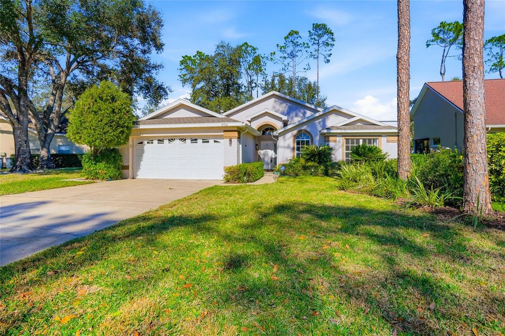 Photo of 5712 Whitebark Drive, Wesley Chapel, FL 33543 (MLS # TB8463430)