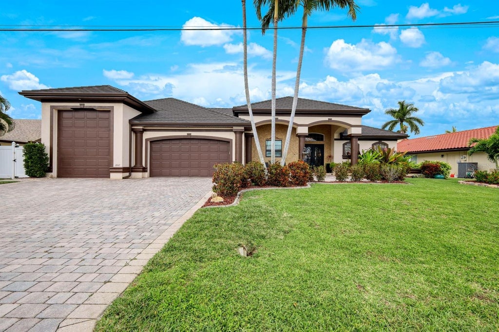 Photo of 2047 SE 28th Terrace, Cape Coral, FL 33904 (MLS # TB8553605)