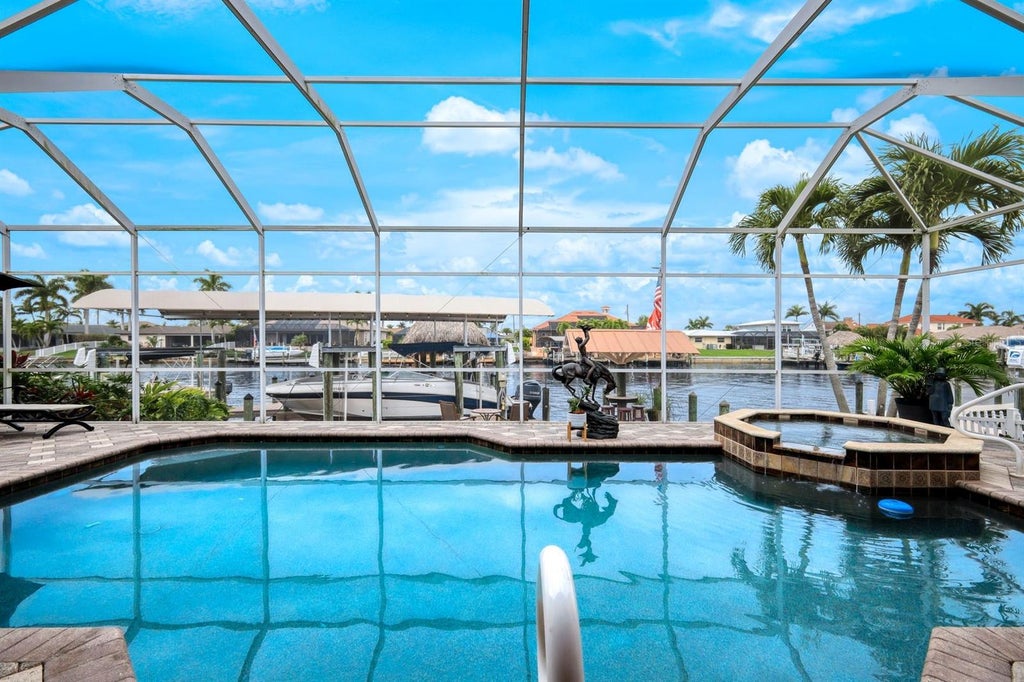 Photo of 2047 SE 28th Terrace, Cape Coral, FL 33904 (MLS # TB8553605)
